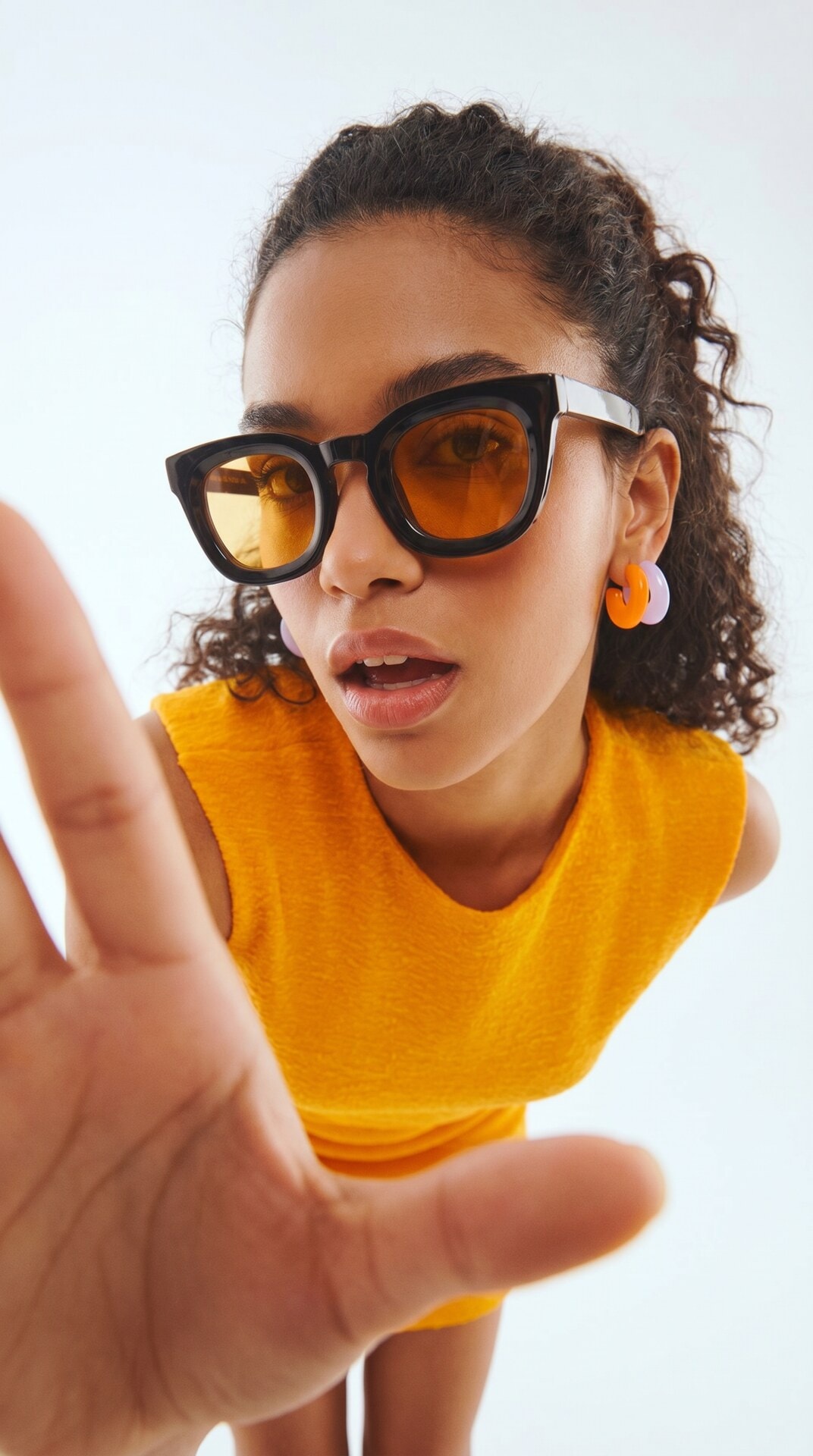 Orange Sunglasses Reach Portrait