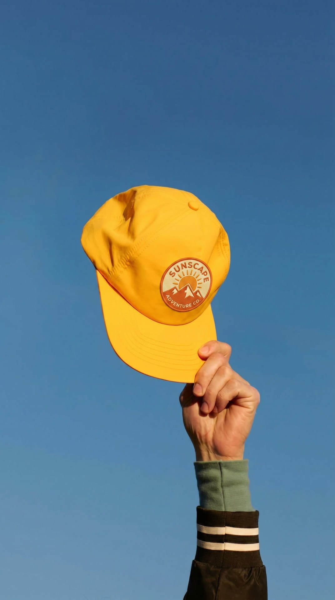 Yellow Cap Sky Hand