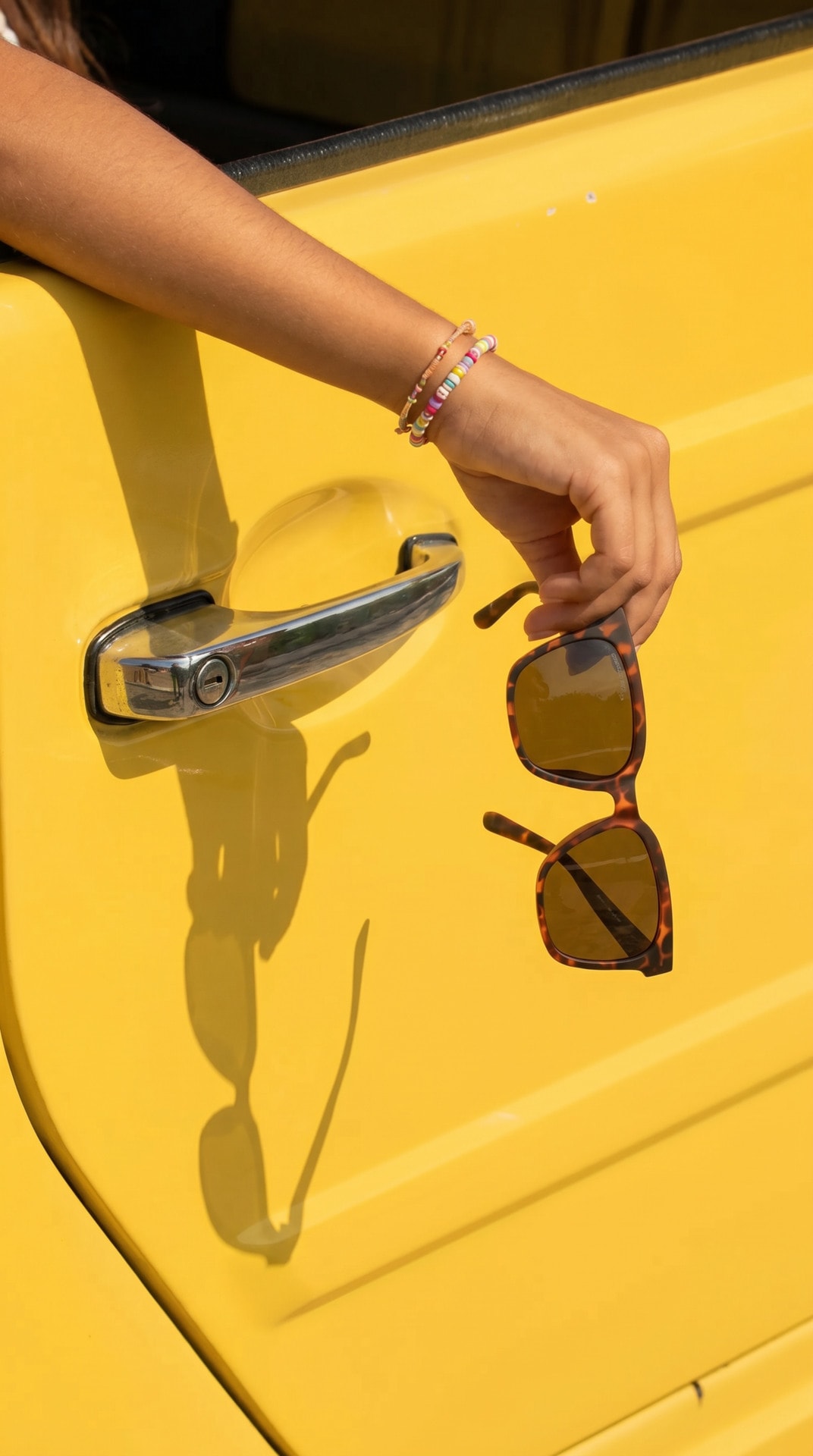 Yellow Car Sunglasses Hand