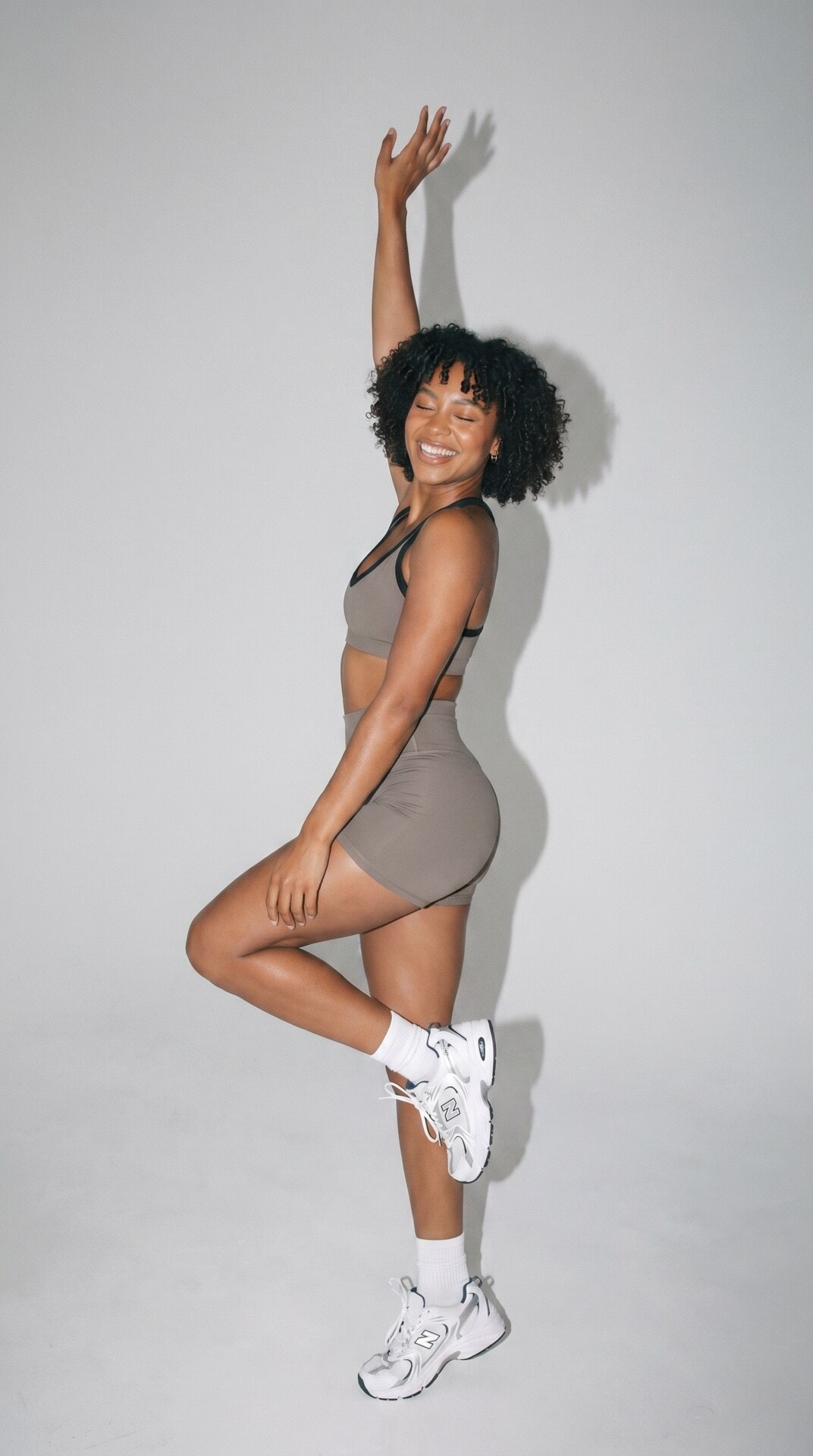 Gray Activewear Jump Pose